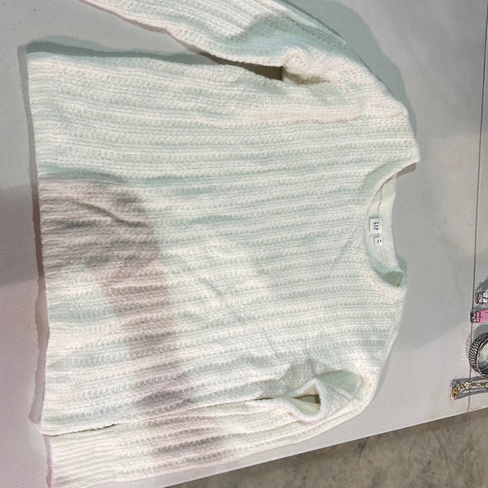 Small white crew neck sweater
